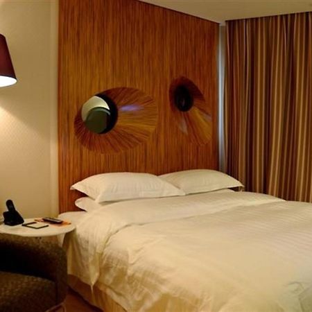Brook Hotel Chang-čou Pokoj fotografie